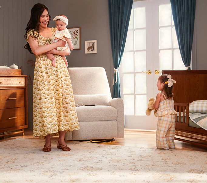 Parent and baby in a nursery