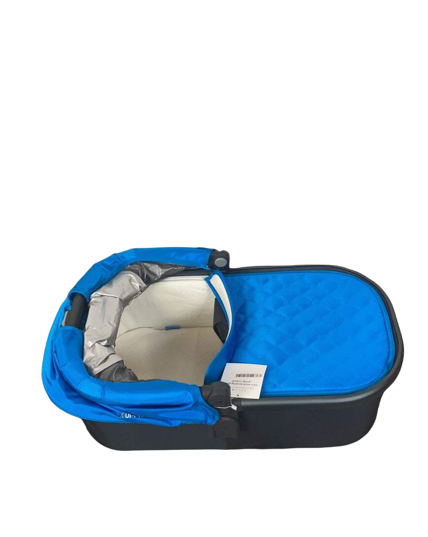 Reference product photo: UPPAbaby 2015 Bassinet, Georgie Marine Blue — overhead view with canopy folded.