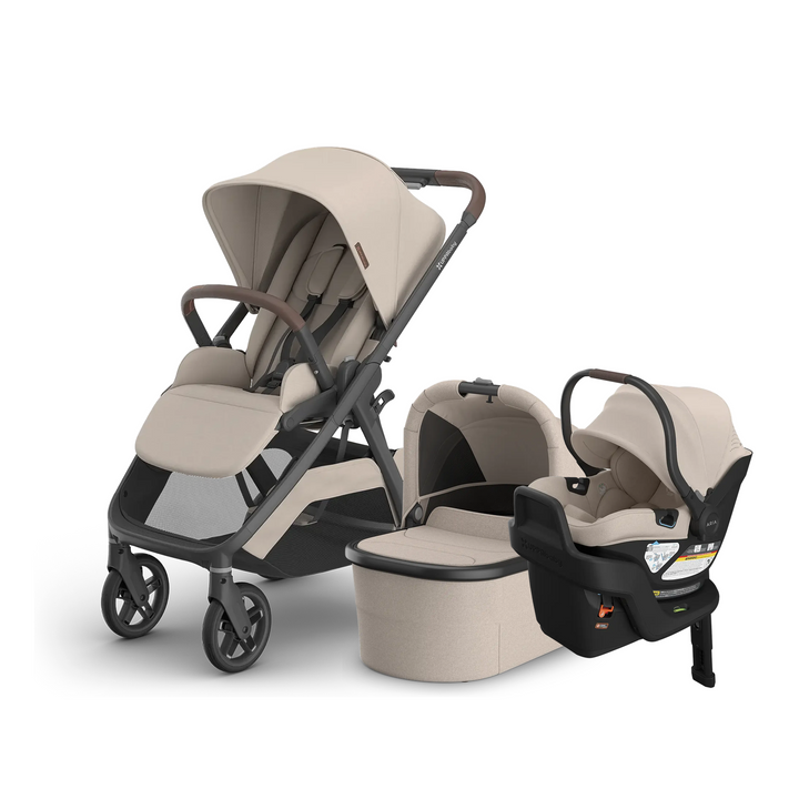 UPPAbaby Kona stroller in Ada with Bassinet V3 and Aria V2 infant car seat and base in Ada
