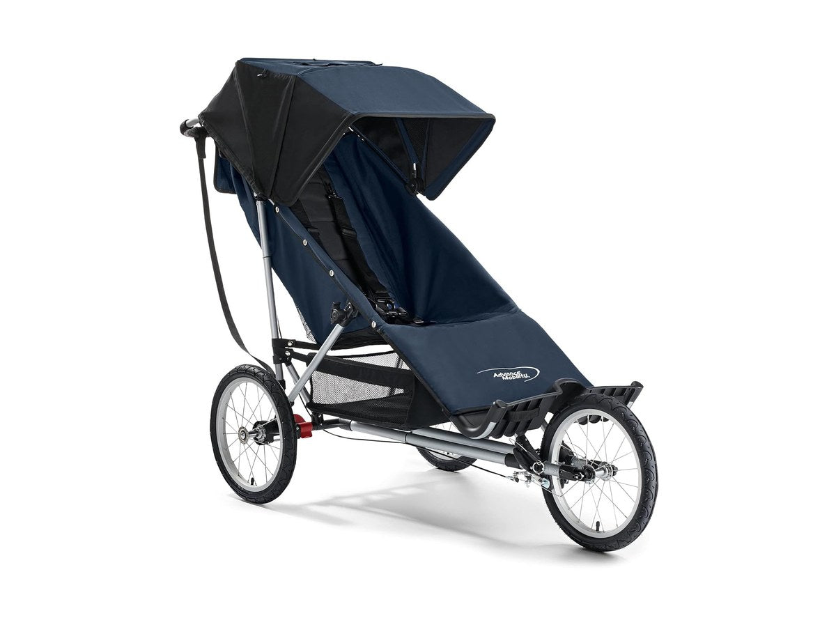 A family on a gravel trail with an all-terrain adaptive chair