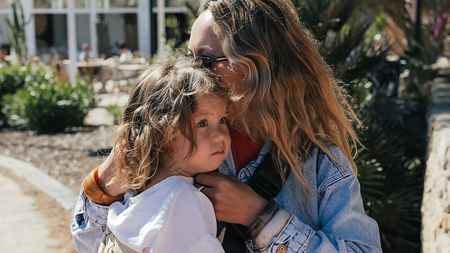 A parent sharing a quiet moment with their child